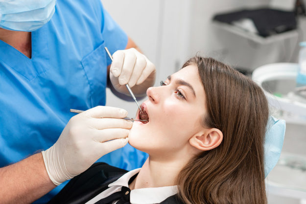 treating a chipped tooth (4) dentist treating a chipped tooth