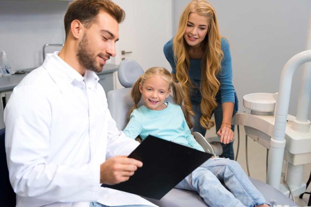 2-How-to-Choose-a-Pediatric-Dental-Office parents choosing a pediatric dental office